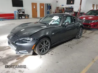 2021 Mazda MX-5 Miata Grand Touring with VIN JM1NDAM73M0451484, listed as a IAAI auction lot 41485044 with 11,328 mi miles and . Bid and sale history available at DreamBid. Image 17.