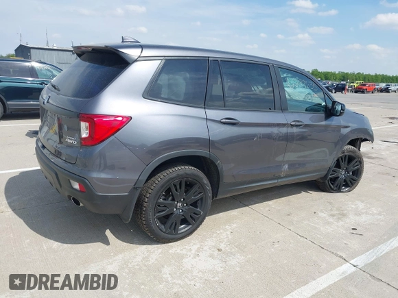 2019 Honda Passport Sport with VIN 5FNYF8H27KB002001, listed as a IAAI auction lot 42299635 with 54,542 mi miles and . Bid and sale history available at DreamBid. Image 4.
