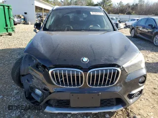 2017 BMW X1 xDrive28i with VIN WBXHT3C35H5F68640, listed as a Copart auction lot 85563114 with 103,480 mi miles and Salvage Title. Bid and sale history available at carsss.com. Image 5.