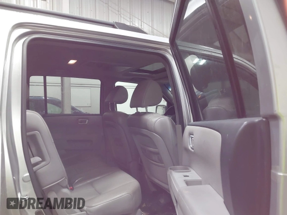 2011 Honda Pilot EX-L with VIN 5FNYF4H66BB029802, listed as a IAAI auction lot 42101545 with 240,127 mi miles and . Bid and sale history available at carsss.com. Image 8.