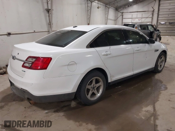 2013 Ford Police Interceptor with VIN 1FAHP2M87DG110878, listed as a IAAI auction lot 41868443 with 132,824 mi miles and . Bid and sale history available at DreamBid. Image 4.
