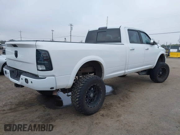 2014 Ram 2500 with VIN 3C6TR5KT3EG309771, listed as a IAAI auction lot 41213964 with 136,617 mi miles and . Bid and sale history available at DreamBid. Image 4.