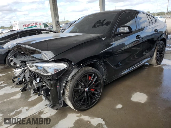 2023 BMW X6 M50i with VIN 5UXCY8C01P9S00552, listed as a Copart auction lot 84193154 with 16,590 mi miles and Salvage Title. Bid and sale history available at carsss.com. Image 1.