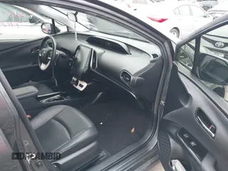 2018 Toyota Prius Plus with VIN JTDKARFPXJ3087064, listed as a IAAI auction lot 41433495 with 118,298 mi miles and . Bid and sale history available at DreamBid. Image 5.