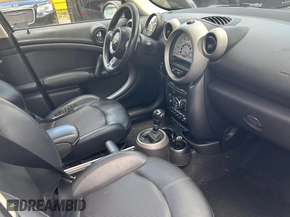 2012 MINI Countryman S с VIN WMWZC5C58CWL60215, выставлен на аукционе Copart как лот 63710935 с пробегом 127 673 миль миль и Чистый • Clean title. История ставок и продаж доступна на DreamBid. Изображение 5.