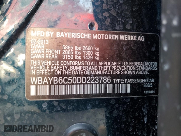 2013 BMW 7 Series 750i xDrive with VIN WBAYB6C50DD223786, listed as a Copart auction lot 87579345 with 143,523 mi miles and Salvage title. Bid and sale history available at DreamBid. Image 12.
