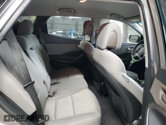 2018 Hyundai Santa Fe 2.4L z VIN 5NMZTDLB2JH096699, wystawiony jako Copart lot #53795775 z przebiegiem 165 794 mil mil oraz Szkoda całkowita • Salvage title. Historia ofert i sprzedaży dostępna na DreamBid. Obrazek 11.