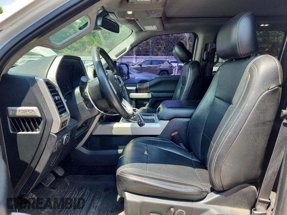 2017 Ford F-150 XL with VIN 1FTEW1EGXHKD51885, listed as a Copart auction lot 63326965 with 106,775 mi miles and Salvage title. Bid and sale history available at DreamBid. Image 7.
