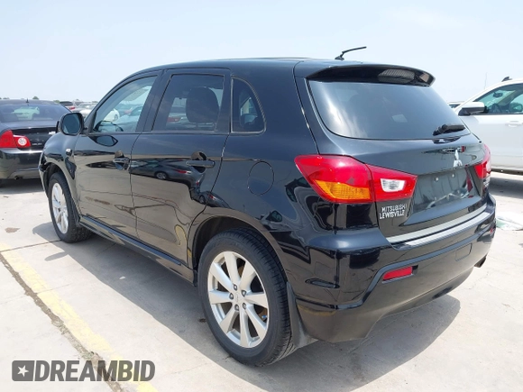 2012 Mitsubishi Outlander SE with VIN JA4AP4AU1CZ002844, listed as a IAAI auction lot 42297590 with 66,065 mi miles and . Bid and sale history available at DreamBid. Image 3.