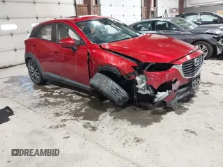 2018 Mazda CX-3 Touring with VIN JM1DKFC79J0318269, listed as a IAAI auction lot 41516043 with 34,514 mi miles. Bid and sale history available at carsss.com. Image 1.