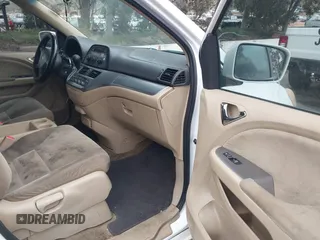 2009 Honda Odyssey EX с VIN 5FNRL38429B011720, выставлен на аукционе IAAI как лот 42034163 с пробегом 168 729 миль миль и . История ставок и продаж доступна на DreamBid. Изображение 5.