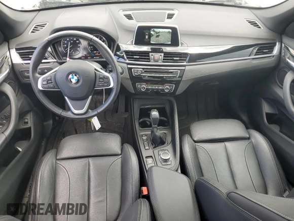 2018 BMW X1 xDrive28i with VIN WBXHT3C35J5L29298, listed as a Copart auction lot 59041435 with 27,612 mi miles and Salvage title. Bid and sale history available at DreamBid. Image 8.