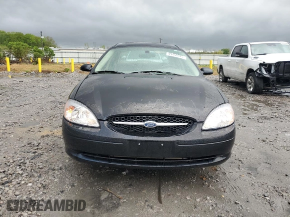 2003 Ford Taurus SEL Deluxe with VIN 1FAHP56S83A225002, listed as a Copart auction lot 49456975 with 199,759 mi miles and Salvage Title. Bid and sale history available at DreamBid. Image 5.