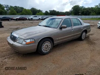 2004 Mercury Grand Marquis GS z VIN 2MEFM74W64X628902, wystawiony jako Copart lot #60746875 z przebiegiem 144 365 mil mil oraz Czysty tytuł • Clean title. Historia ofert i sprzedaży dostępna na DreamBid. Obrazek 1.