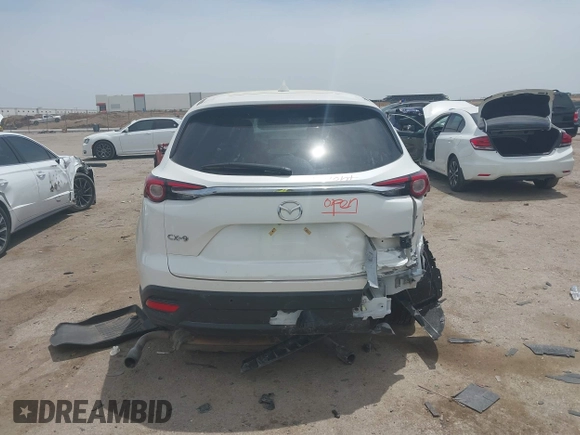 2021 Mazda CX-9 Touring with VIN JM3TCACY9M0526376, listed as a IAAI auction lot 42264478 with 74,671 mi miles and . Bid and sale history available at DreamBid. Image 16.