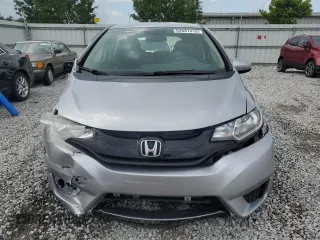 2017 Honda Fit LX with VIN JHMGK5H5XHS006599, listed as a Copart auction lot 62881415 with 58,381 mi miles and Clean title. Bid and sale history available at DreamBid. Image 5.