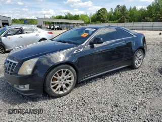 2012 Cadillac CTS Premium z VIN 1G6DP1E30C0129580, wystawiony jako Copart lot #54165805 z przebiegiem 128 842 mil mil oraz Szkody całkowita. Historia ofert i sprzedaży dostępna na DreamBid. Obrazek 1.
