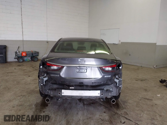 2017 Mazda Mazda6 Touring with VIN JM1GL1V57H1112266, listed as a IAAI auction lot 41553530 with 46,599 mi miles. Bid and sale history available at carsss.com. Image 17.