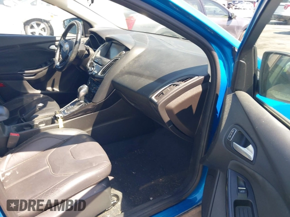 2015 Ford Focus Titanium with VIN 1FADP3J24FL322247, listed as a IAAI auction lot 41998030 with 151,341 mi miles and . Bid and sale history available at carsss.com. Image 5.