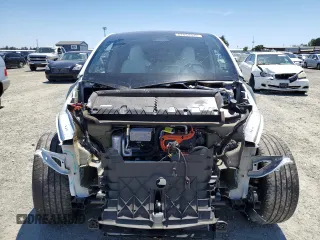 2024 Tesla Model Y Long Range with VIN 7SAYGDEE4RF054753, listed as a Copart auction lot 57989375 with 21,394 mi miles and Salvage title. Bid and sale history available at DreamBid. Image 5.