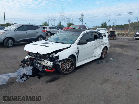 2011 Mitsubishi Lancer Evolution GSR with VIN JA32W8FV9BU045781, listed as a IAAI auction lot 41308314 with 102,840 mi miles. Bid and sale history available at carsss.com. Image 18.