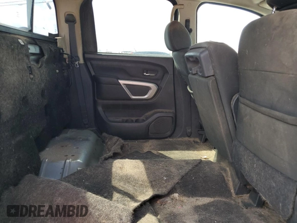 2017 Nissan Titan SV z VIN 1N6AA1EJ8HN522119, wystawiony jako Copart lot #52708905 z przebiegiem 139 582 mil mil oraz Szkoda całkowita • Salvage title. Historia ofert i sprzedaży dostępna na DreamBid. Obrazek 10.