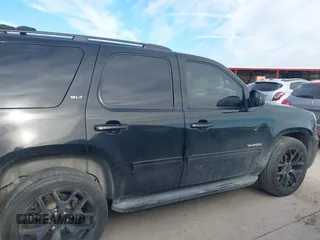 2012 GMC Yukon SLT with VIN 1GKS2CE06CR150096, listed as a IAAI auction lot 41703820 with 308,958 mi miles. Bid and sale history available at carsss.com. Image 13.