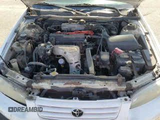 1999 Toyota Camry LE z VIN 4T1BG22K7XU440181, wystawiony jako Copart lot #59304385 z przebiegiem 113 864 mil mil oraz Czysty tytuł • Clean title. Historia ofert i sprzedaży dostępna na DreamBid. Obrazek 11.