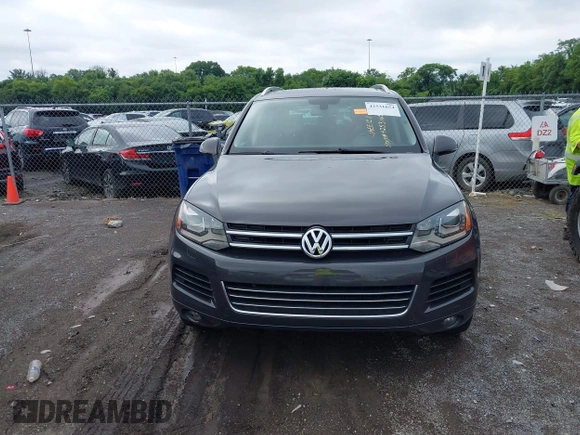 2012 Volkswagen Touareg Sport with VIN WVGFK9BP0CD002939, listed as a IAAI auction lot 42531654 with 222,435 mi miles and . Bid and sale history available at DreamBid. Image 12.