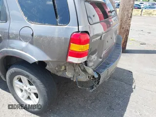 2006 Ford Escape Hybrid z VIN 1FMCU96H86KA52519, wystawiony jako IAAI lot #42443003 z przebiegiem 162 469 mil mil oraz . Historia ofert i sprzedaży dostępna na DreamBid. Obrazek 6.