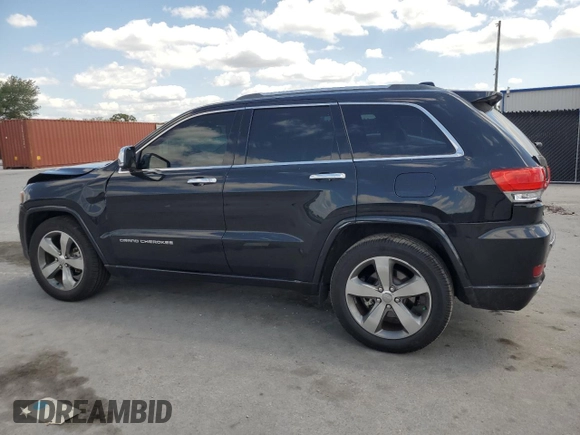 2014 Jeep Grand Cherokee Overland with VIN 1C4RJECG9EC173693, listed as a Copart auction lot 53747045 with 73,234 mi miles and Non Repairable. Bid and sale history available at carsss.com. Image 2.