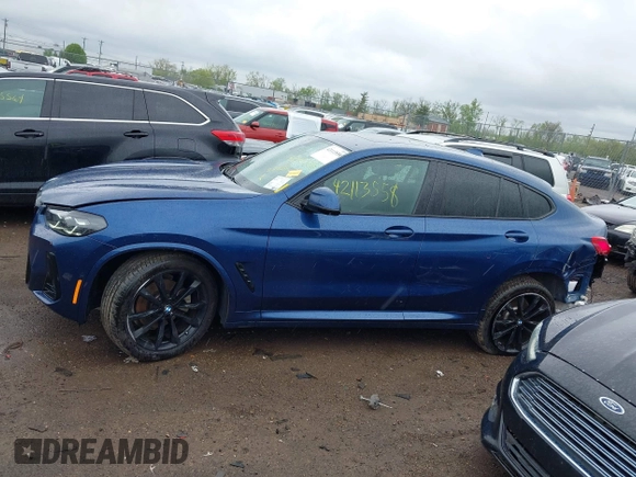 2023 BMW X4 xDrive30i z VIN 5UX33DT01P9P86340, wystawiony jako IAAI lot #42113558 z przebiegiem 27 226 mil mil oraz . Historia ofert i sprzedaży dostępna na DreamBid. Obrazek 15.