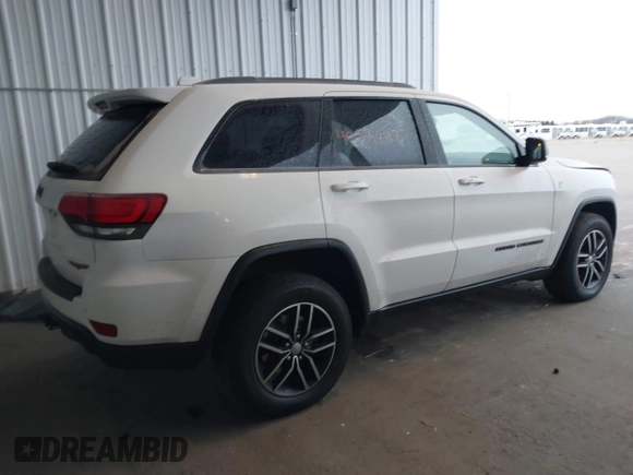 2018 Jeep Grand Cherokee Trailhawk with VIN 1C4RJFLGXJC264438, listed as a IAAI auction lot 40974417 with 117,717 mi miles and . Bid and sale history available at DreamBid. Image 4.