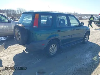 1999 Honda CR-V LX with VIN JHLRD2844XC001615, listed as a IAAI auction lot 41908729 with 269,189 mi miles. Bid and sale history available at carsss.com. Image 4.