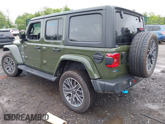 2023 Jeep Wrangler Sahara with VIN 1C4JJXP64PW684210, listed as a IAAI auction lot 42244388 with 23,622 mi miles and . Bid and sale history available at DreamBid. Image 3.