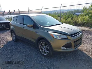 2013 Ford Escape SEL with VIN 1FMCU0HX9DUB79720, listed as a IAAI auction lot 42876188 with 148,391 mi miles and . Bid and sale history available at DreamBid. Image 1.