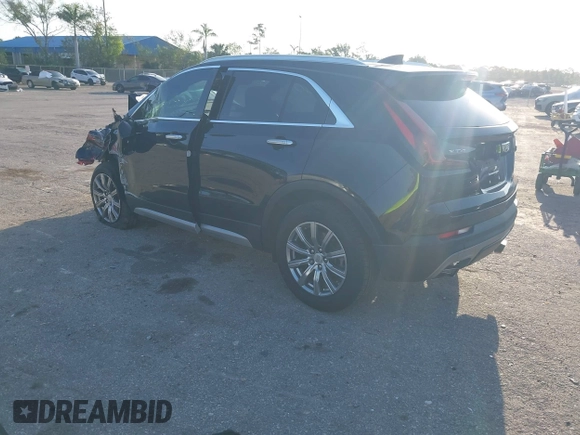 2021 Cadillac XT4 FWD Premium Luxury with VIN 1GYFZCR47MF000064, listed as a IAAI auction lot 41974115 with 1 mi miles. Bid and sale history available at carsss.com. Image 3.