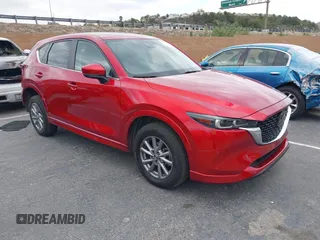 2024 Mazda CX-5 S Carbon Edition z VIN JM3KFBCL3R0431347, wystawiony jako IAAI lot #42057582 z przebiegiem 34 870 mil mil oraz . Historia ofert i sprzedaży dostępna na DreamBid. Obrazek 1.
