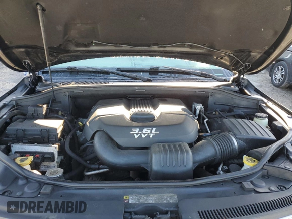 2013 Jeep Grand Cherokee Overland with VIN 1C4RJFCG2DC653207, listed as a Copart auction lot 48680885 with 276,020 mi miles and Salvage Title. Bid and sale history available at carsss.com. Image 12.