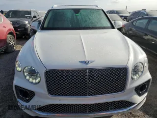 2022 Bentley Bentayga V8 z VIN SJAAM2ZV4NC011285, wystawiony jako Copart lot #75246624 z przebiegiem 33 179 mil mil oraz Nie do naprawy. Historia ofert i sprzedaży dostępna na DreamBid. Obrazek 5.