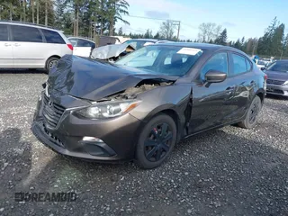2016 Mazda 3 i Sport with VIN JM1BM1T7XG1298654, listed as a IAAI auction lot 41946415 with 114,894 mi miles and . Bid and sale history available at carsss.com. Image 2.