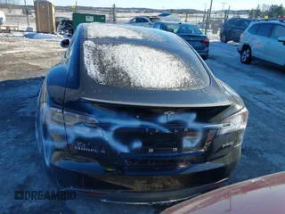 2013 Tesla Model S with VIN 5YJSA1CNODFP07903, listed as a IAAI auction lot 41281788 with Not Provided miles. Bid and sale history available at carsss.com. Image 16.