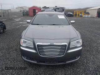 2011 Chrysler 300 with VIN 2C3CA6CT8BH547555, listed as a IAAI auction lot 41858626 with 141,853 mi miles. Bid and sale history available at carsss.com. Image 12.