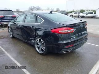 2019 Ford Fusion Titanium with VIN 3FA6P0K93KR243148, listed as a IAAI auction lot 41757469 with 78,859 mi miles. Bid and sale history available at carsss.com. Image 3.