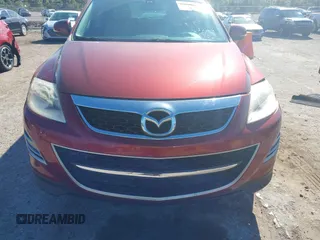 2011 Mazda CX-9 Grand Touring с VIN JM3TB3DV9B0314125, выставлен на аукционе IAAI как лот 41886308 с пробегом 109 521 миль миль и . История ставок и продаж доступна на DreamBid. Изображение 13.