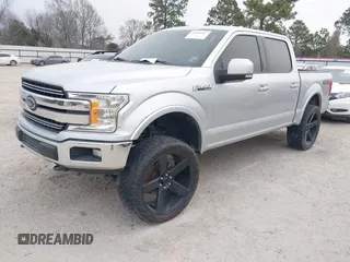 2019 Ford F-150 XL with VIN 1FTEW1E59KFC48276, listed as a IAAI auction lot 41498967 with 162,638 mi miles. Bid and sale history available at carsss.com. Image 2.