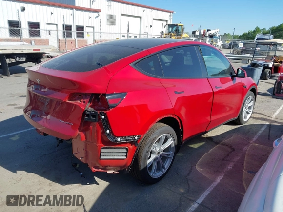 2023 Tesla Model Y Long Range with VIN 7SAYGDEEXPA182702, listed as a IAAI auction lot 42023730 with Not provided miles and . Bid and sale history available at DreamBid. Image 4.