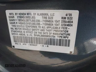 2005 Honda Odyssey TOURING with VIN 5FNRL38855B091754, listed as a IAAI auction lot 42131326 with 258,635 mi miles. Bid and sale history available at carsss.com. Image 9.