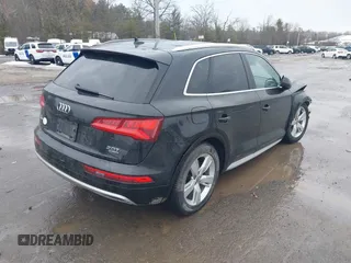 2018 Audi Q5 Premium Plus z VIN WA1BNAFY2J2151497, wystawiony jako IAAI lot #41688418 z przebiegiem 78 345 mil mil oraz . Historia ofert i sprzedaży dostępna na DreamBid. Obrazek 4.