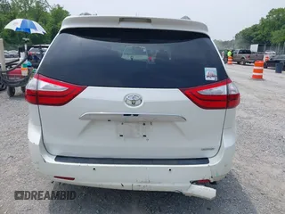 2015 Toyota Sienna XLE with VIN 5TDYK3DC3FS586329, listed as a IAAI auction lot 42496805 with 132,828 mi miles and . Bid and sale history available at DreamBid. Image 16.